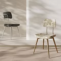 Stylish Single Chairs With Black Metal Legs And Patterned Gold Leg Design In Modern Interior