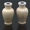 Pair of Beige Ceramic Vases with Intricate Carved Texture on Black Background