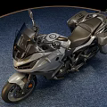 Silver Touring Motorcycle With Sleek Design Black Seat And Side Cases