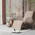 Modern Beige Lounge Chair with Curved Design Round Side Table and Green Plant