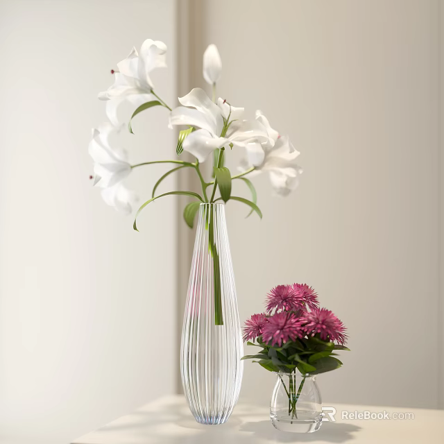 White Lilies in Transparent Ribbed Vase with Pink Chrysanthemums in Small Vase 3d model 