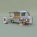 Silver Mobile Café Truck Serving Coffee and Pie with Open Side Table TV and Flowers