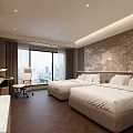 Modern Hotel Room Interior With Twin Beds White Linens And City View Through Large Window