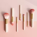 Premium Pink Makeup Brushes With White Handles And Gold Accents For Cosmetic Tools