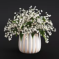 Potted Lily of the Valley With White Flowers Green Leaves And White Gold Striped Vase