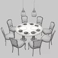 Modern Round Dining Table Set With White And Gray Chairs And Hanging Pendant Lights