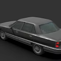 Vintage Dark Gray Sedan With Illuminated Headlights And Silver Rims