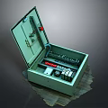 Household Electrical Distribution Box Open with Green Metal Case and Internal Safety Components