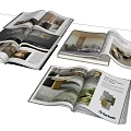 Open Interior Design Books Showcasing Modern Room Interiors And Furniture