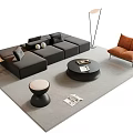Modern Black L Shaped Sofa Set With Orange Armchair Round Coffee Table And Floor Lamp