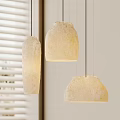 Natural Textured Beige Pendant Lights Hanging With Soft Lighting Near Window Blinds