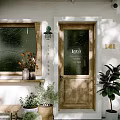 Cozy Storefront With Wooden Door Laca Sign Window Wall Lamp Green Plants And Decorative Flowers