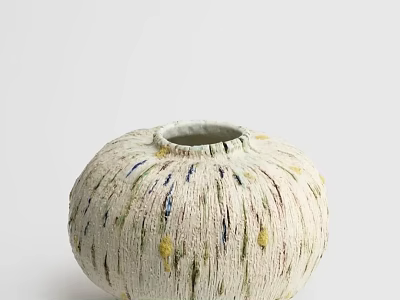 Round Cream Colored Ceramic Vessel With Textured Surface And Yellow Blue Accents 3d model