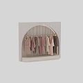 Stylish Winter Coats On Arch Display Rack With Soft Neutral Tones