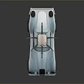 Blue Vintage Sports Car Featuring Streamlined Design And Roof Equipment With Metallic Finish