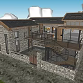 Rustic Stone Guesthouse Building With Wooden Roof Balcony Staircase And Garden Surrounded By Trees