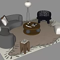 Curved Gray Sofa Set With Round Coffee Table Pillows Patterned Chair Floor Lamp And Rug