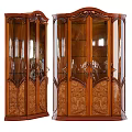 Elegant Vintage Wooden Display Cabinet With Glass Doors And Intricate Carved Details