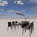 Modern Kitchen Dining Space With Island Table Dark Countertop Chairs Hanging Light And Fruit Decor