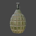 Classic Green Military Hand Grenade With Textured Surface And Metal Pin