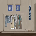 Clothing Display Rack With Hanging Apparel Blue Patterned Fabrics And Decorative Shoes