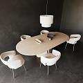 Modern Dining Room Interior With Oval Wooden Table And White Chairs