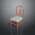Ornate Single Chair With Orange Metal Frame And Patterned Cushion