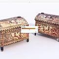 Two Ornate Vintage Chests With Intricate Decorative Patterns And Lidded Storage