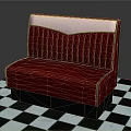 Red Upholstered Sofa With White Backrest And Tufted Design On Black And White Checkered Floor
