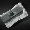 Vintage Metal Pencil Sharpener With Gray Casing Round Knob And Textured Surface