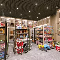 Organized Specialty Store Interior With Shelves Of Daily Products And Food Items