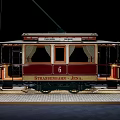 Vintage Streetsville 1889 Tram Model Red Beige Body Windows Platform Black Background