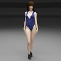 Brown Haired Woman in Blue One Piece Swimsuit Standing Against Gray Background with Black Boots