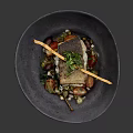 Pan-Seared Cod Fillet with Fresh Herbs Cherry Tomatoes and Greens in Dark Bowl