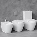 Modern White Bathroom Toilets Display With Different Styles Against Grey Wall Background