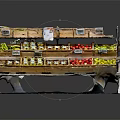 Multi Tiered Fruit Display Shelf Organized With Various Fresh Fruits Wooden Crates And Yellow Labels