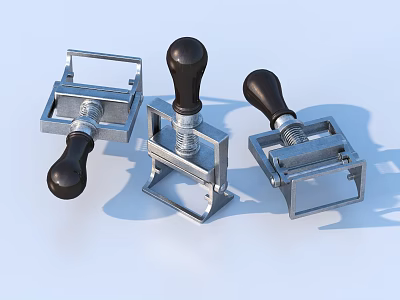 Three Metal Kitchen Press Tools With Black Handles For Household Use 3d model