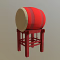 Traditional Red Drum Musical Instrument With Light Colored Head And Red Wooden Stand