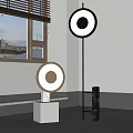 Modern Floor Lamps With Circular Design White Base And Black Stand In Bright Interior