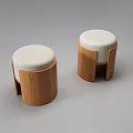 Two Modern Wooden Stools With White Round Seats And Curved Frame Design