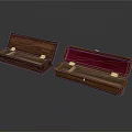 Open Wooden Boxes With Wooden And Red Velvet Interiors And Metal Clasps