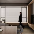 Warm Minimalist Wood Tone Living And Dining Room With Large Bay Window And Storage Cabinets