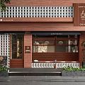Cafe Storefront With Red Brick Wall Glass Windows Coffee Chai Tea Signage And Green Plants