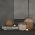 Minimalist Ceramic Vessels With Textured Design On Books And Small Candles Gray Background