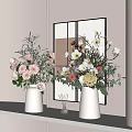 White Vases With Fresh Flowers And Green Foliage On Modern Shelf By Wall Mirror