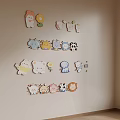 Colorful Cartoon Animal Flower Shaped Decorative Wall Hangings on Beige Wall Kids Room