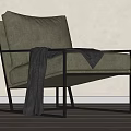Modern Accent Chair with Black Metal Frame Light Gray Fabric Cushion and Dark Blanket