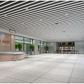 Modern Spacious Station Hall Interior With Service Counter And Glass Entrance Doors