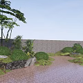 Lush Green Shrubs In Garden With Stream Stones Mossy Ground And Tall Trees