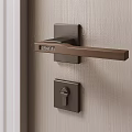 Modern GRANT Door Handle in Brushed Bronze on Light Gray Door with Lock